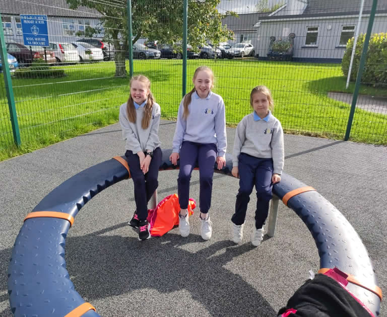 Girls on climbing ring from Our Lady Of Mercy Primary School Sligo